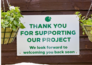 Zoomed in image of a sign that reads 'Thank you for supporting pur project'